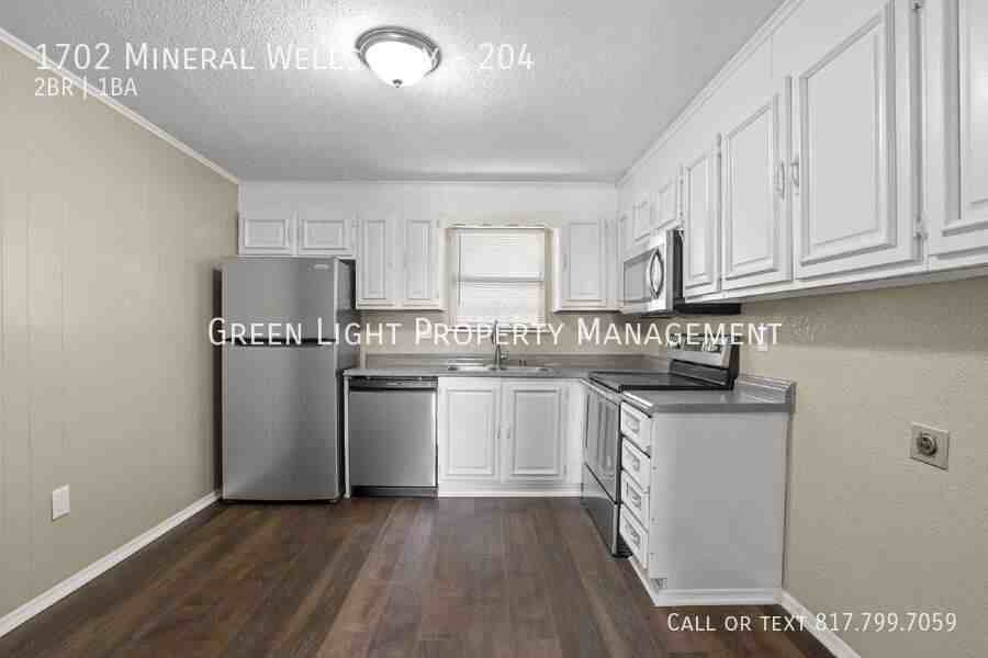 1702 Mineral Wells Highway #204 - Photo 5 of 11