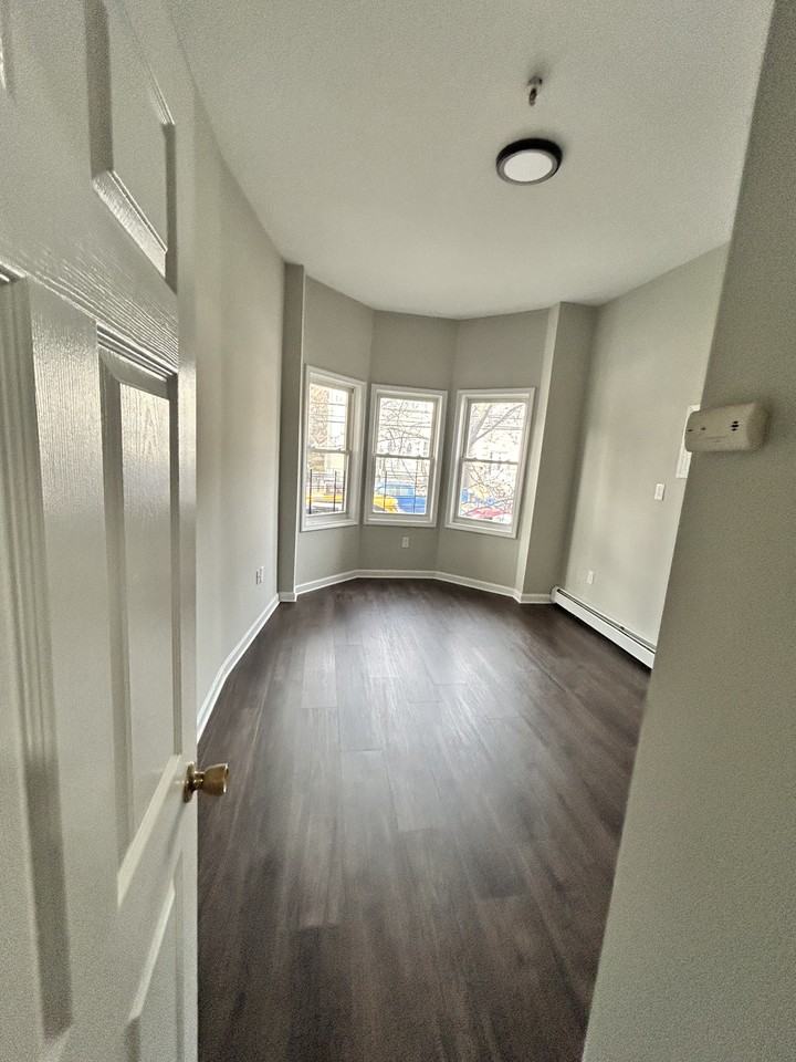 162 Clerk St #1 - Photo 2 of 3