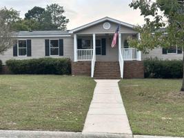 featured image of 221 Bentgrass Lane