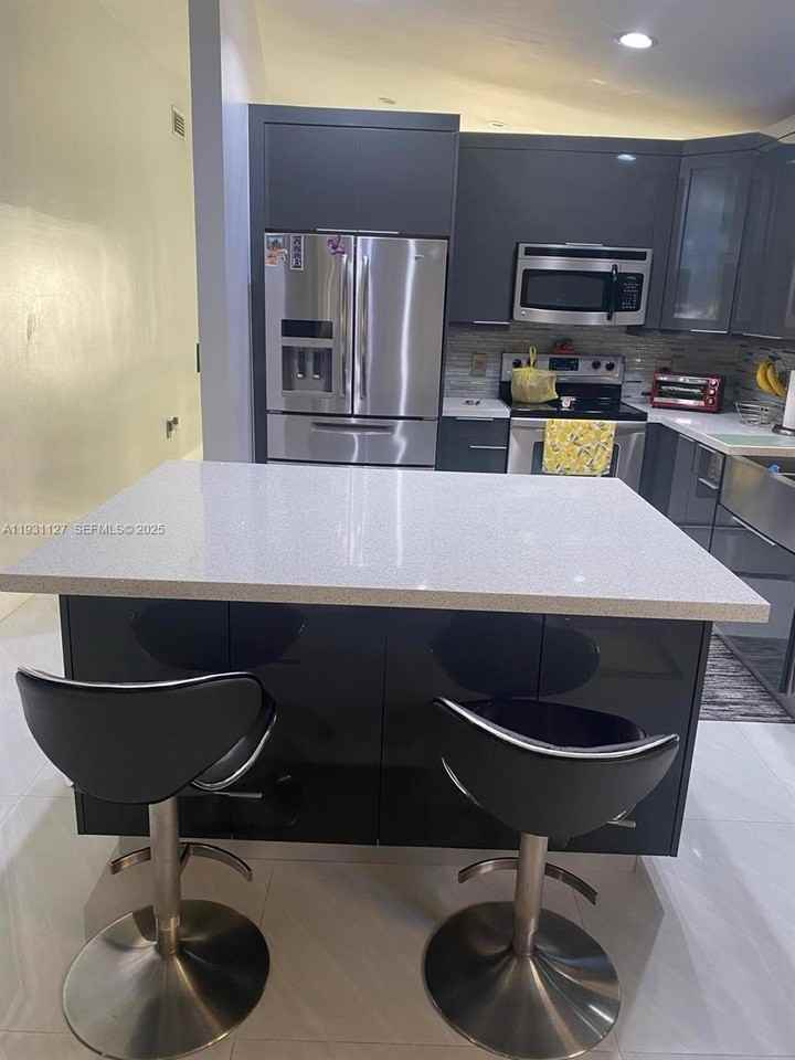 7145 West 31st Avenue - Photo 4 of 26