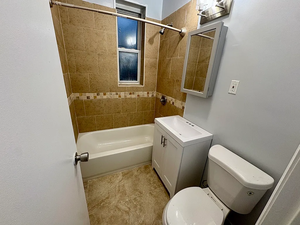 5993 Riverdale Ave - Photo 2 of 2