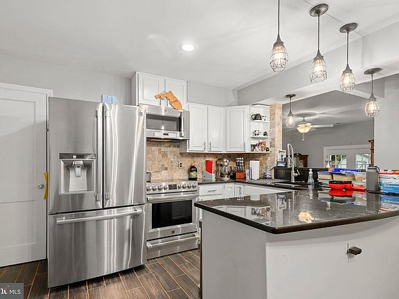 8313 Rolling Road - Photo 3 of 11