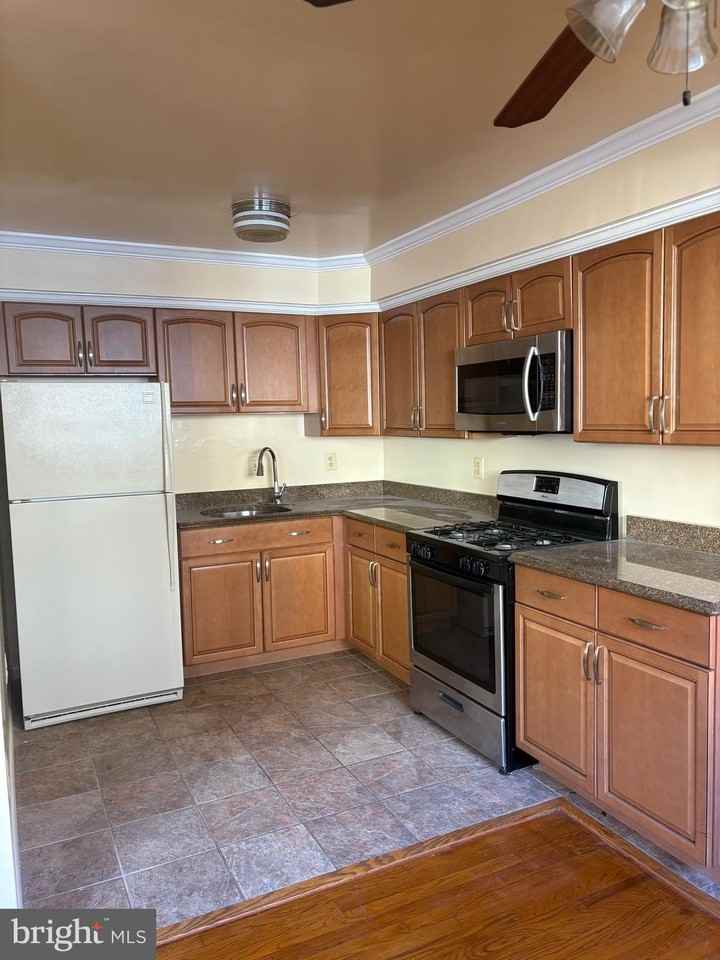 7044 Eastern Ave Nw - Photo 7 of 18