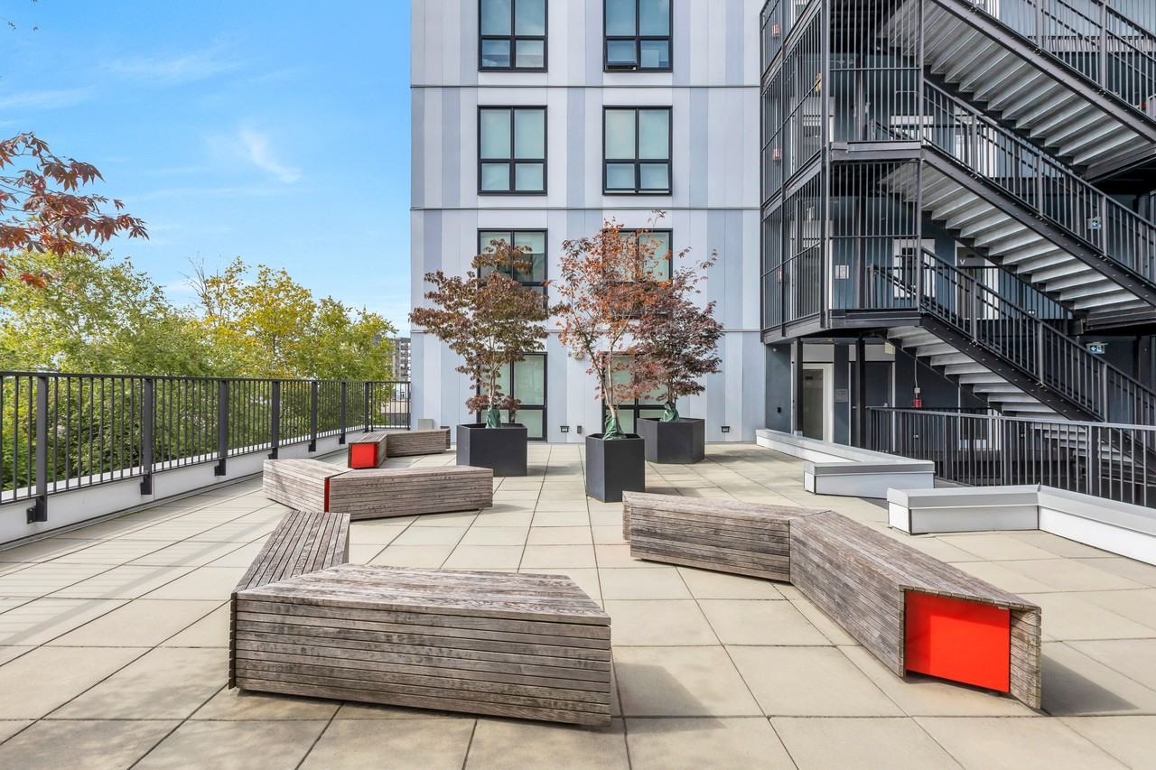 Victoria - 127 E 12th St - Photo 3 of 50