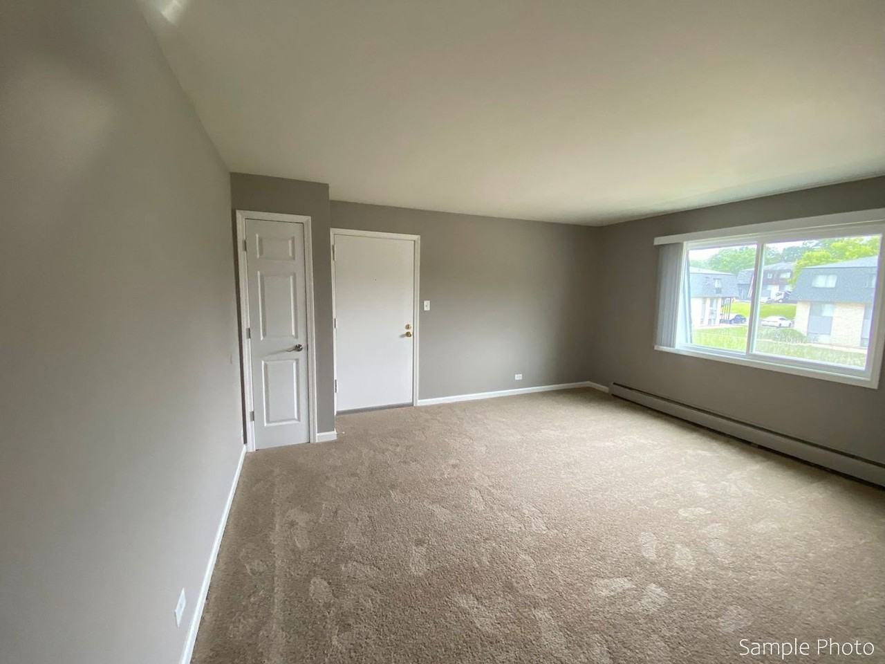 Carriage House Apartments LLC - Photo 2 of 46