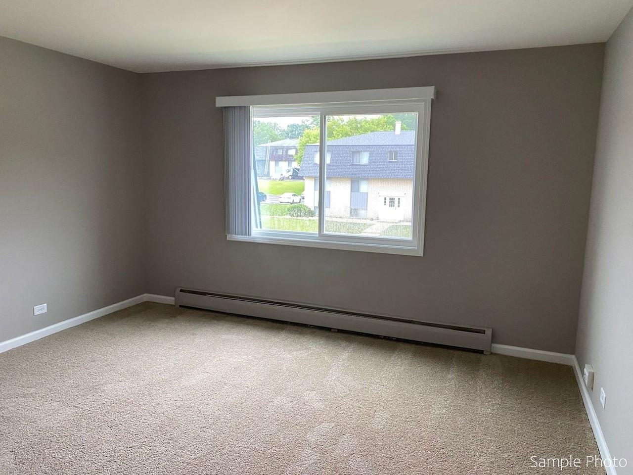 Carriage House Apartments LLC - Photo 3 of 46