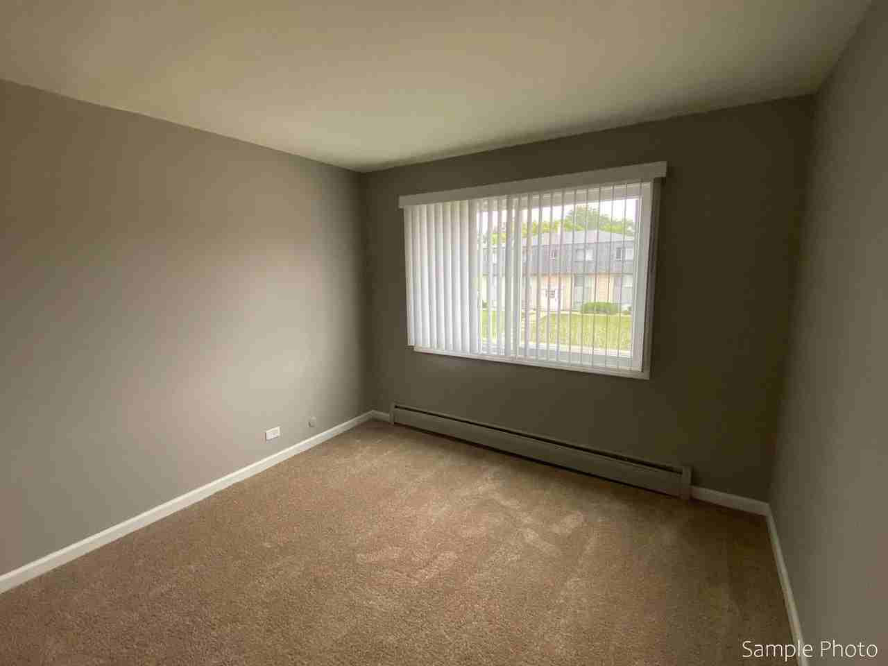 Carriage House Apartments LLC - Photo 5 of 46