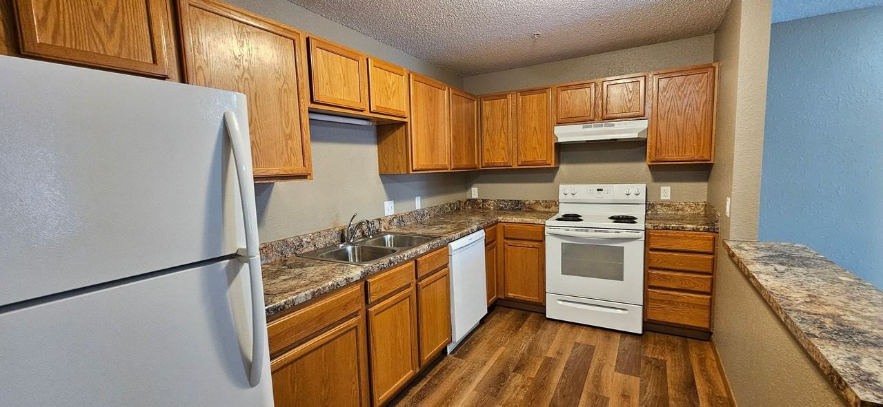 Park Village Apartments - Photo 2 of 16