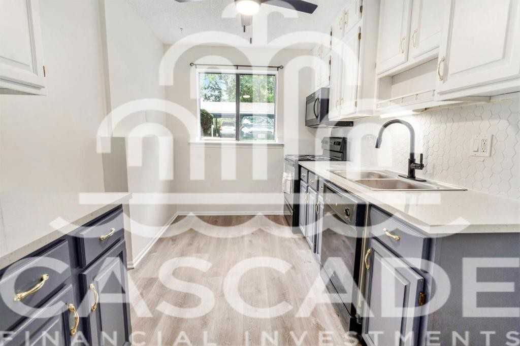 8143 Holmes Rd - Photo 2 of 12