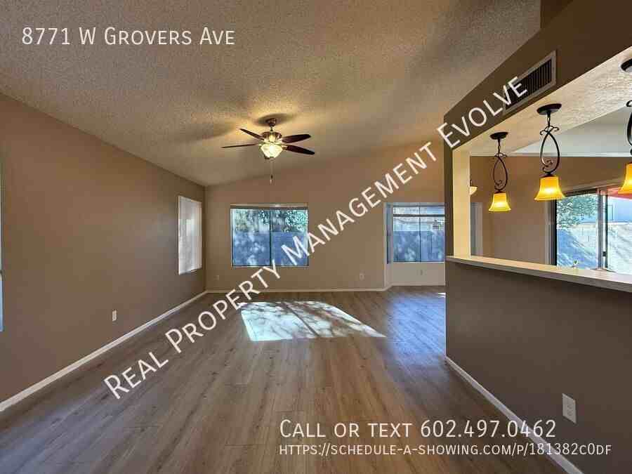 8771 W Grovers Ave - Photo 3 of 27