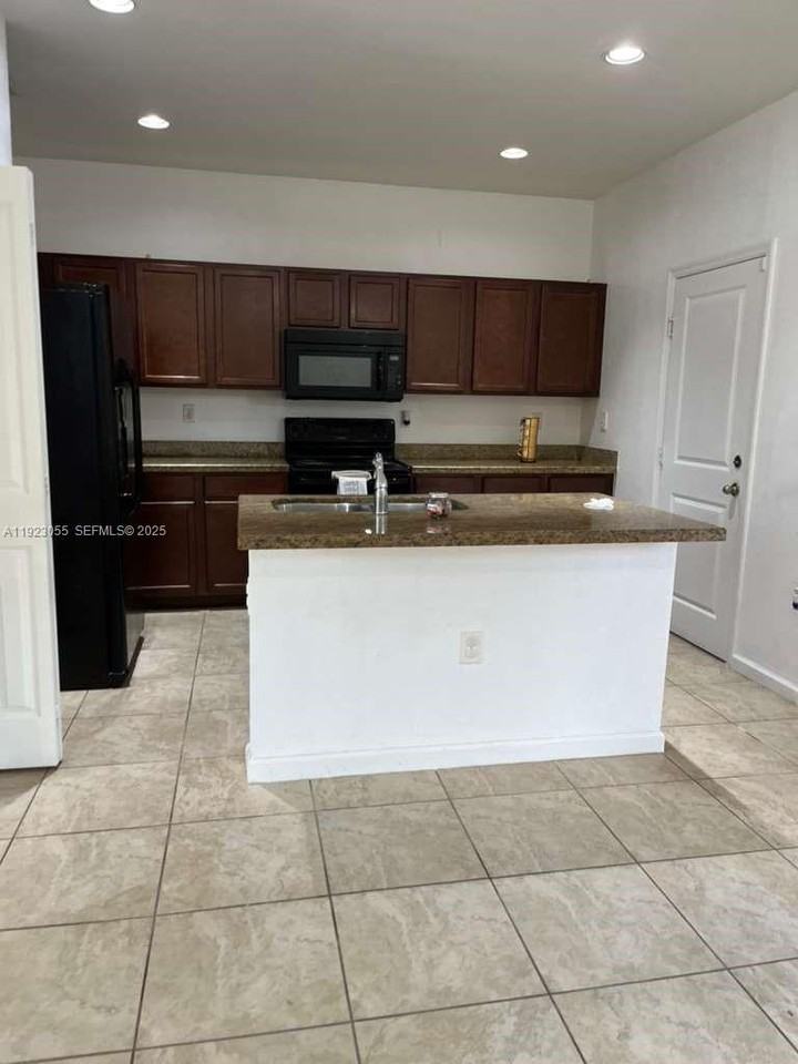 11665 Sw 244th St #11665-116 - Photo 2 of 32