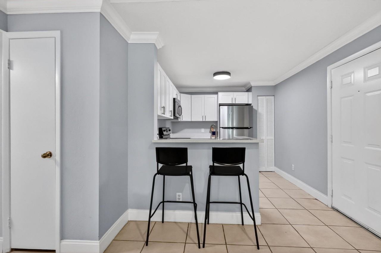 1740 Palm Cove Blvd #4-307 - Photo 3 of 31