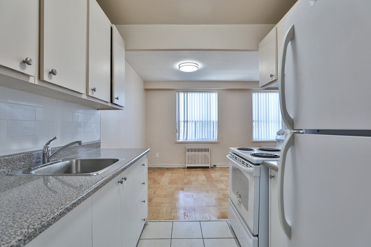 2223-2225 Eglinton Ave. E - Photo 2 of 44