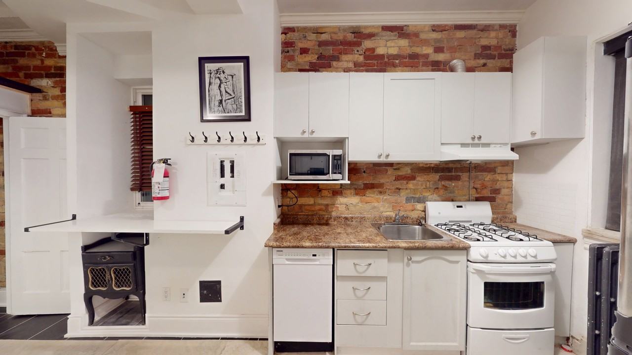 THE GERRARD FLATS - Photo 3 of 34