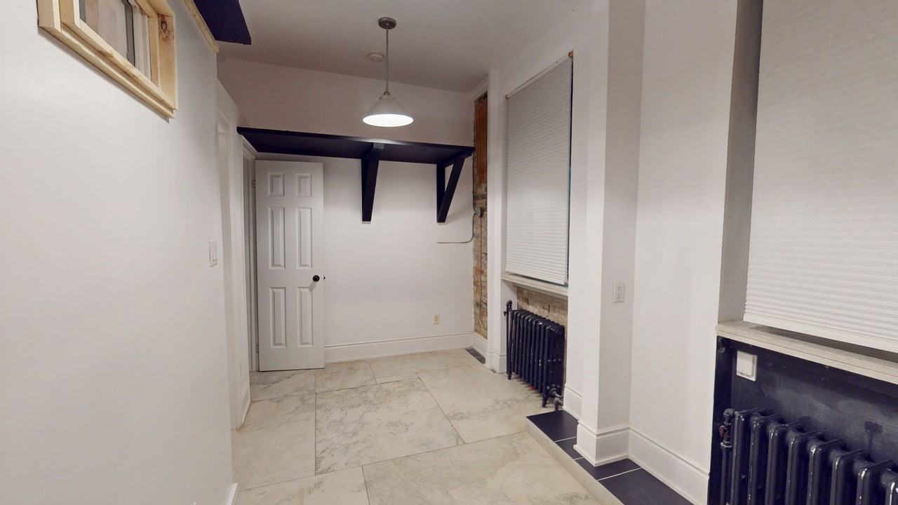 THE GERRARD FLATS - Photo 6 of 34