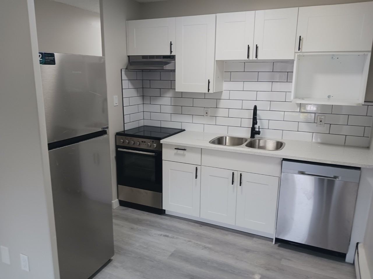 Gemini Apartments - Photo 3 of 7