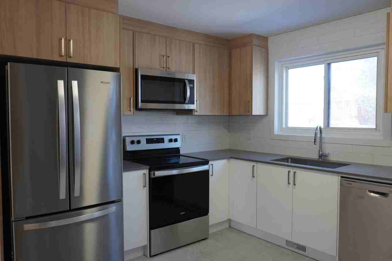 Naughton & Presland Townhomes Ltd. - Photo 3 of 10