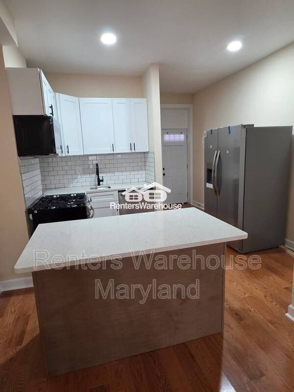 921 N Patterson Park Ave - Photo 2 of 22
