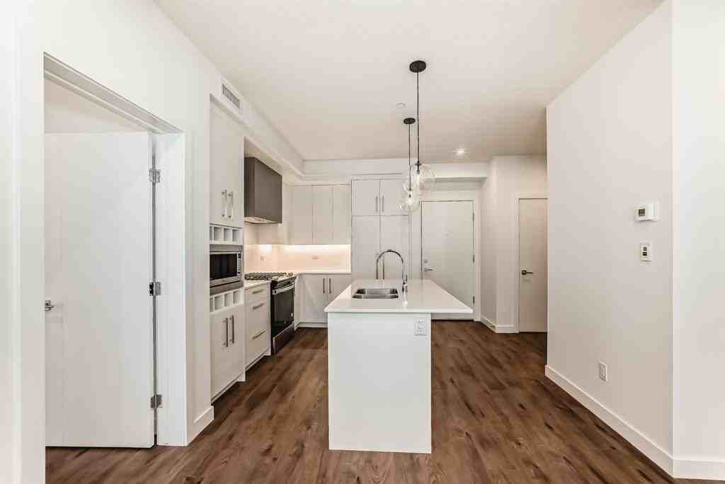 #205, 8370 Broadcast Ave SW - Photo 3 of 30