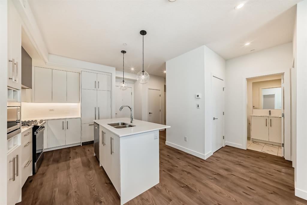 #205, 8370 Broadcast Ave SW - Photo 4 of 30