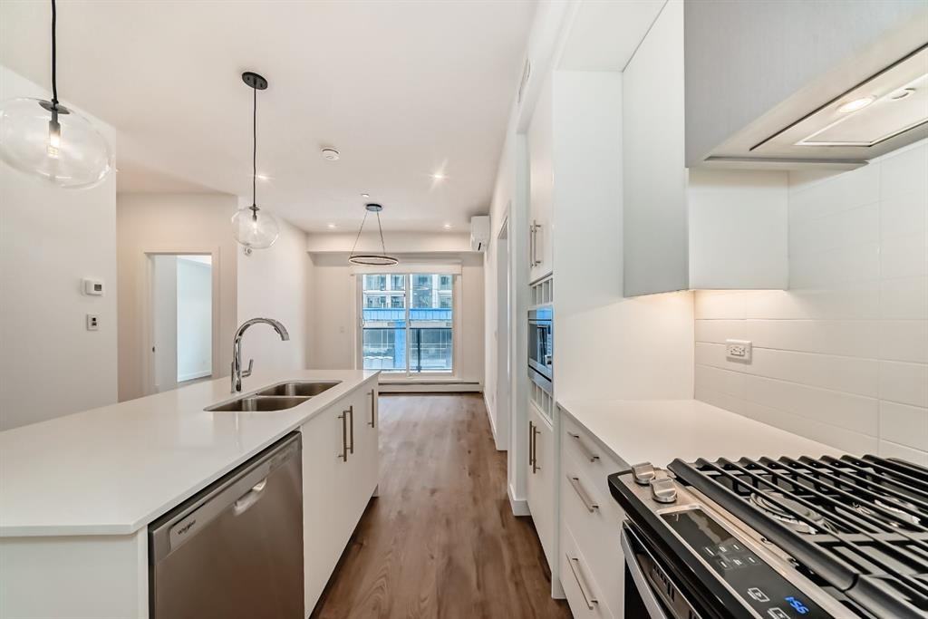 #205, 8370 Broadcast Ave SW - Photo 6 of 30