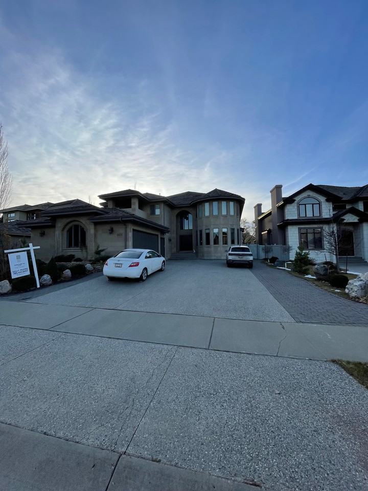 4835 Mactaggart Crest Ct NW — Luxury 4,864 sq. ft Executive Home for Rent - Photo 2 of 50