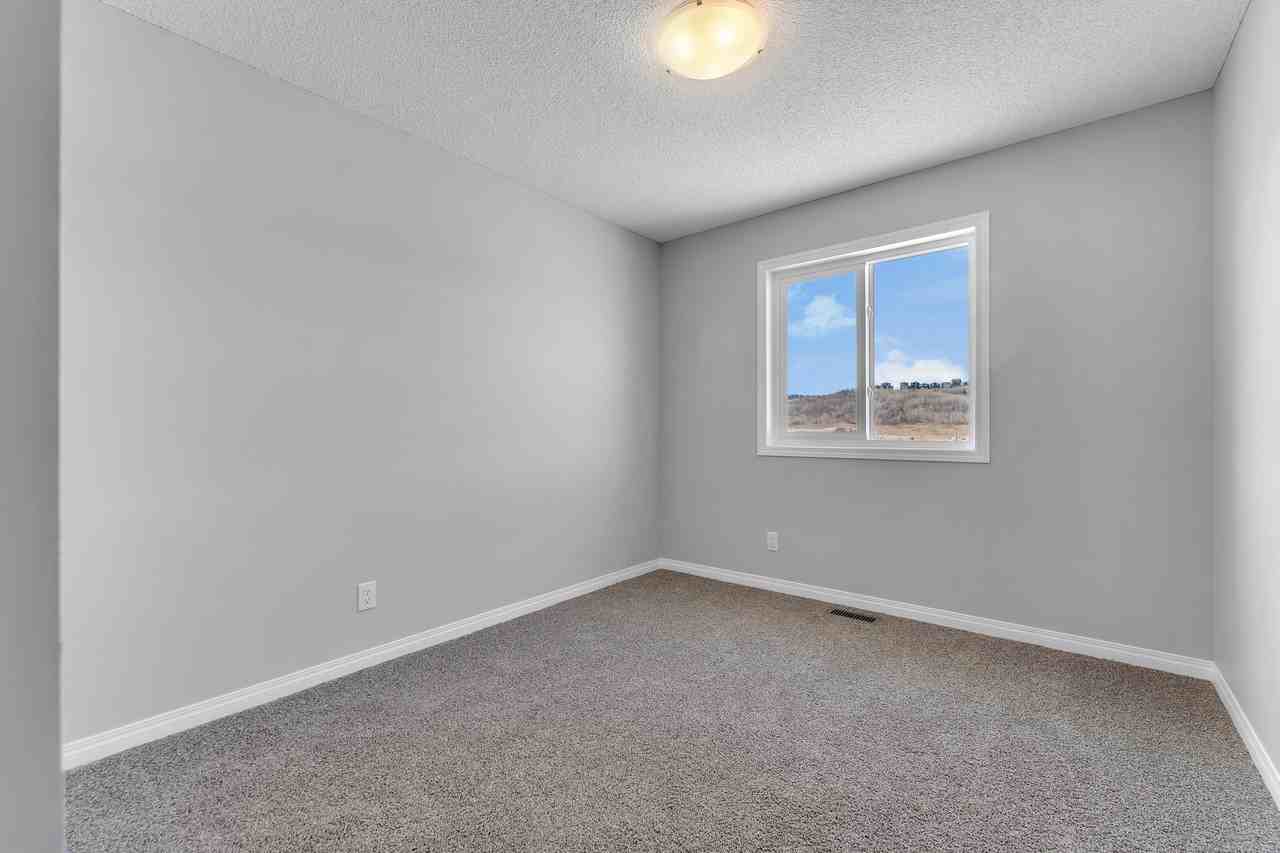 667 Wolf Willow Blvd Se - Photo 5 of 27