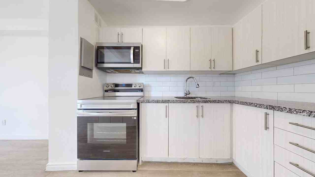 Melvin Apartments - Photo 3 of 50