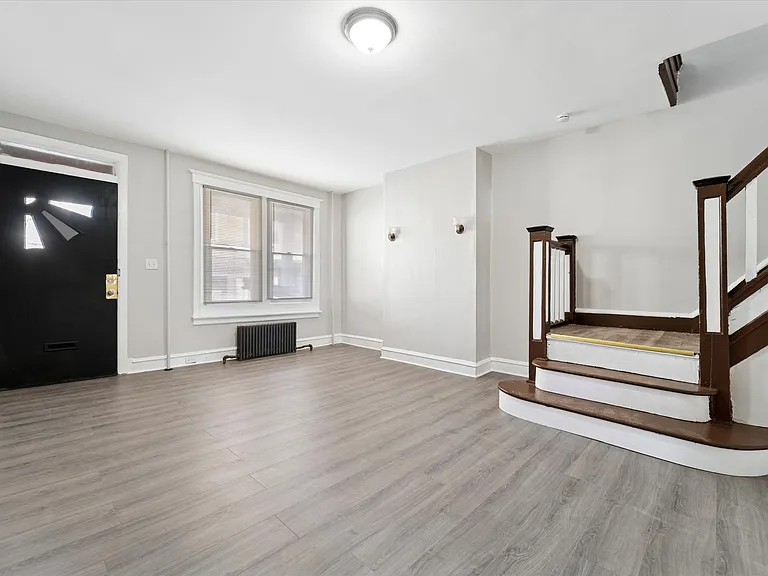 5706 Delancey St - Photo 7 of 12