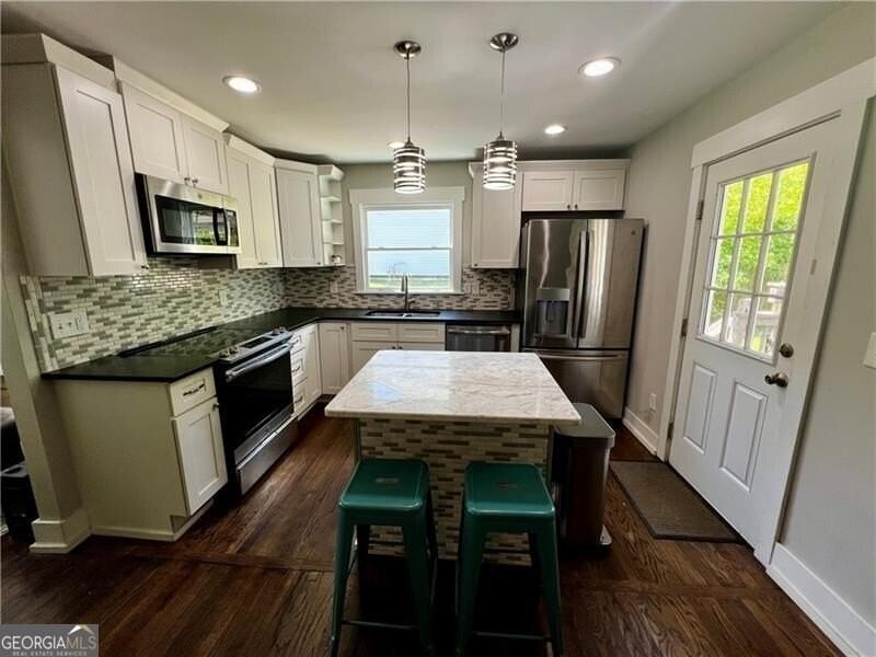 1611 Wellswood Dr Se - Photo 7 of 16