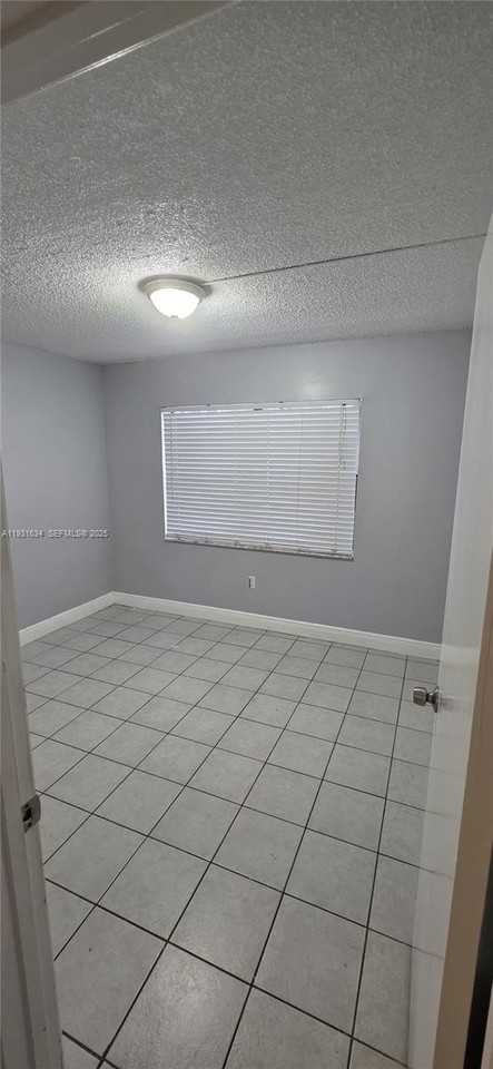 10006 Nw 6th St #101 - Photo 2 of 11