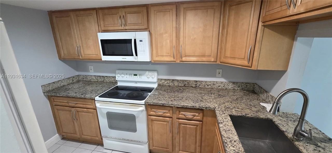 10006 Nw 6th St #101 - Photo 6 of 11