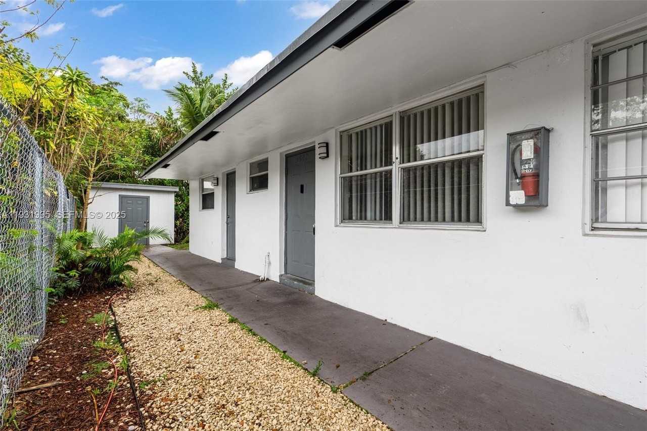 5842 Nw 23rd St #1-4 - Photo 2 of 8