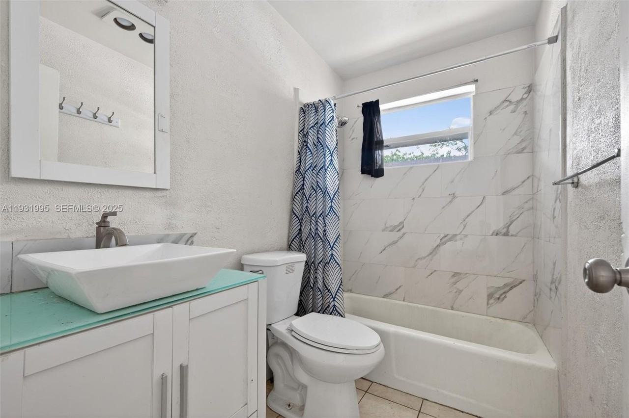 5842 Nw 23rd St #1-4 - Photo 7 of 8