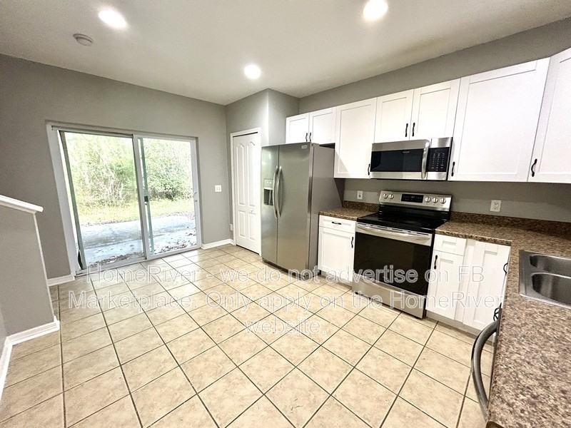 5813 Fishhawk Ridge Dr - Photo 5 of 20