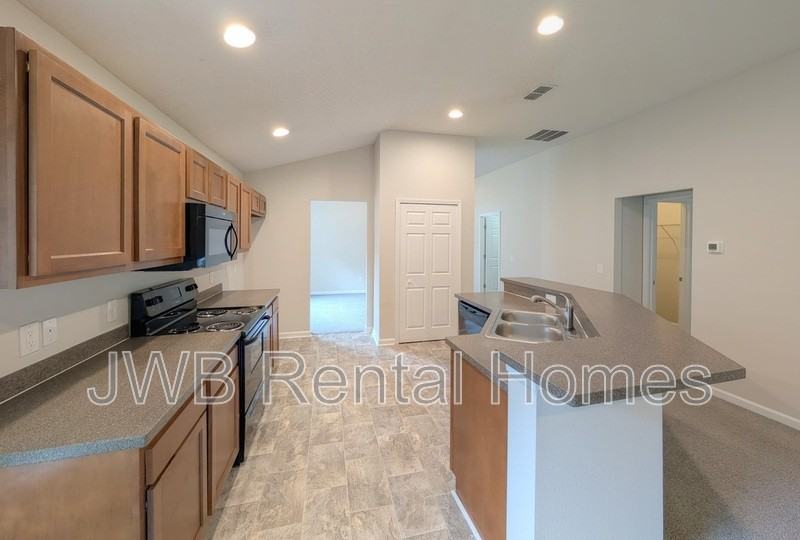 5591 Village Pond Cir - Photo 4 of 19