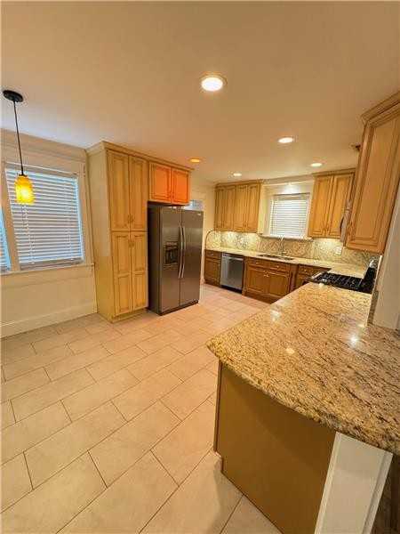 502 E 66th St - Photo 3 of 15