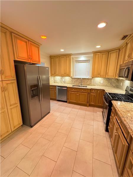 502 E 66th St - Photo 5 of 15