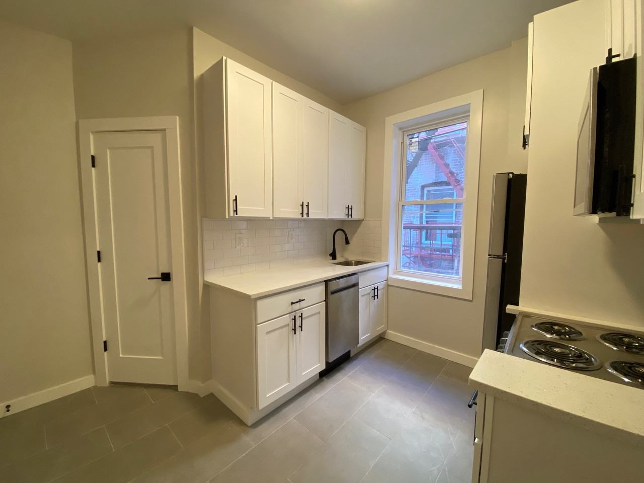 5608 Hudson AveApt 13 #5608-13 - Photo 2 of 8