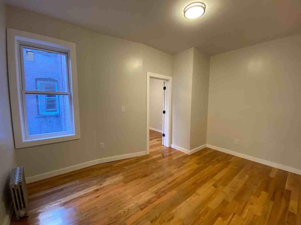 5608 Hudson AveApt 13 #5608-13 - Photo 4 of 8