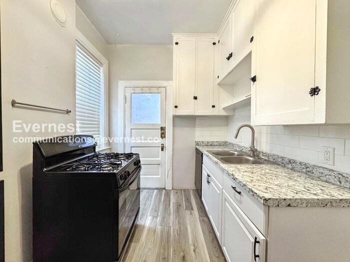 1147 N Marion St #1 - Photo 3 of 14