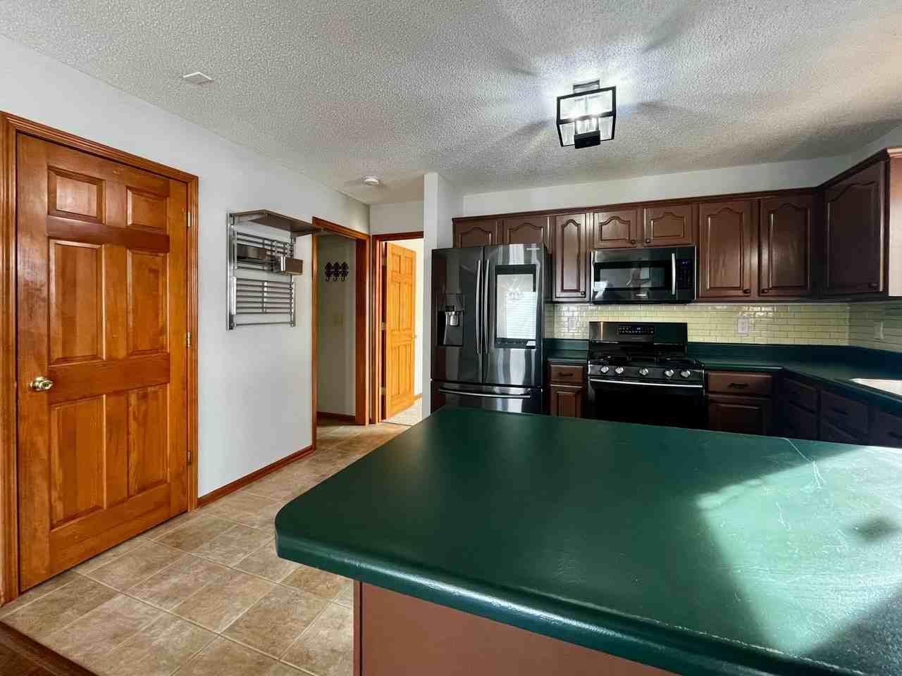 9101 Olmston Dr - Photo 5 of 40