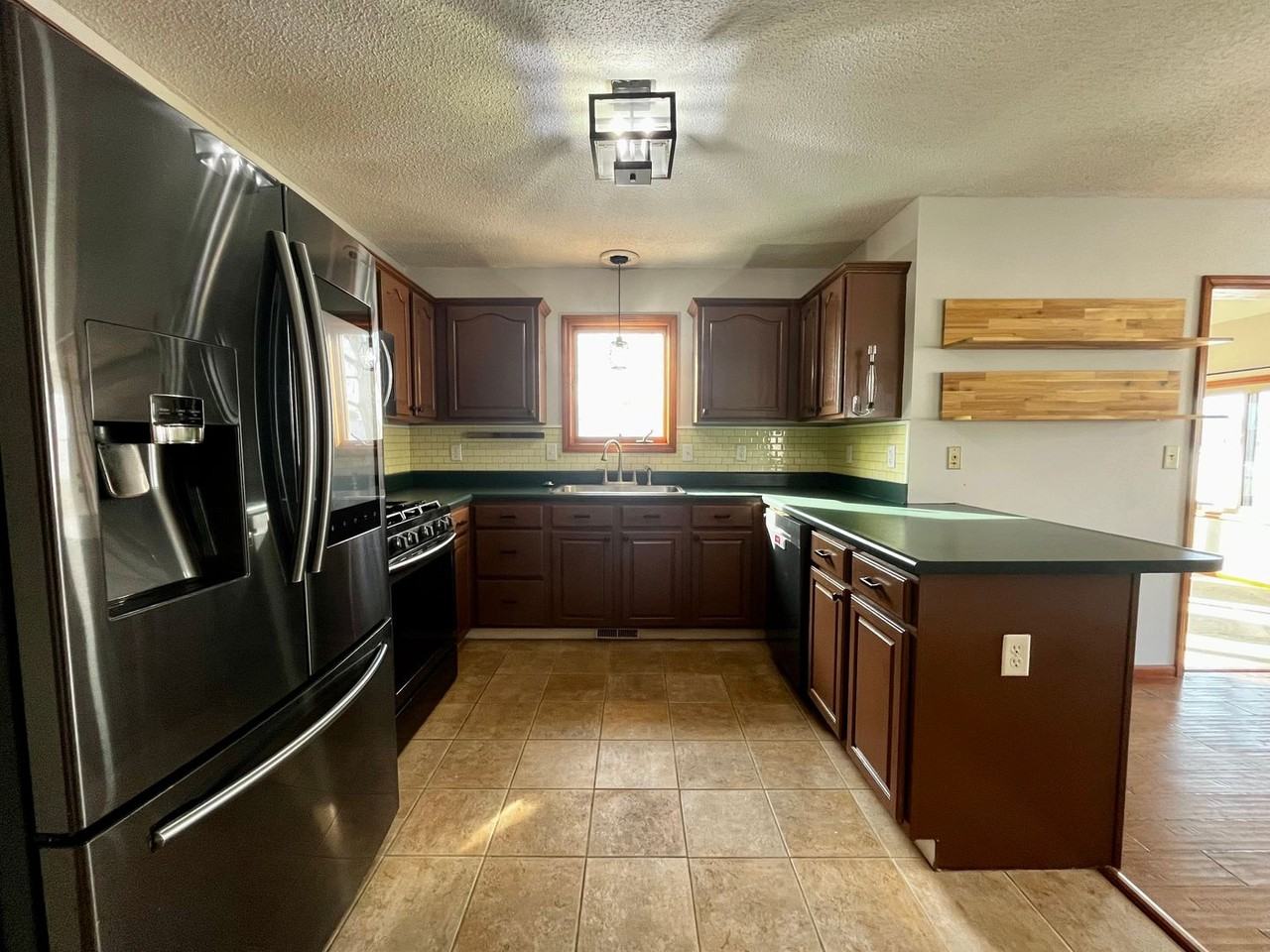 9101 Olmston Dr - Photo 7 of 40