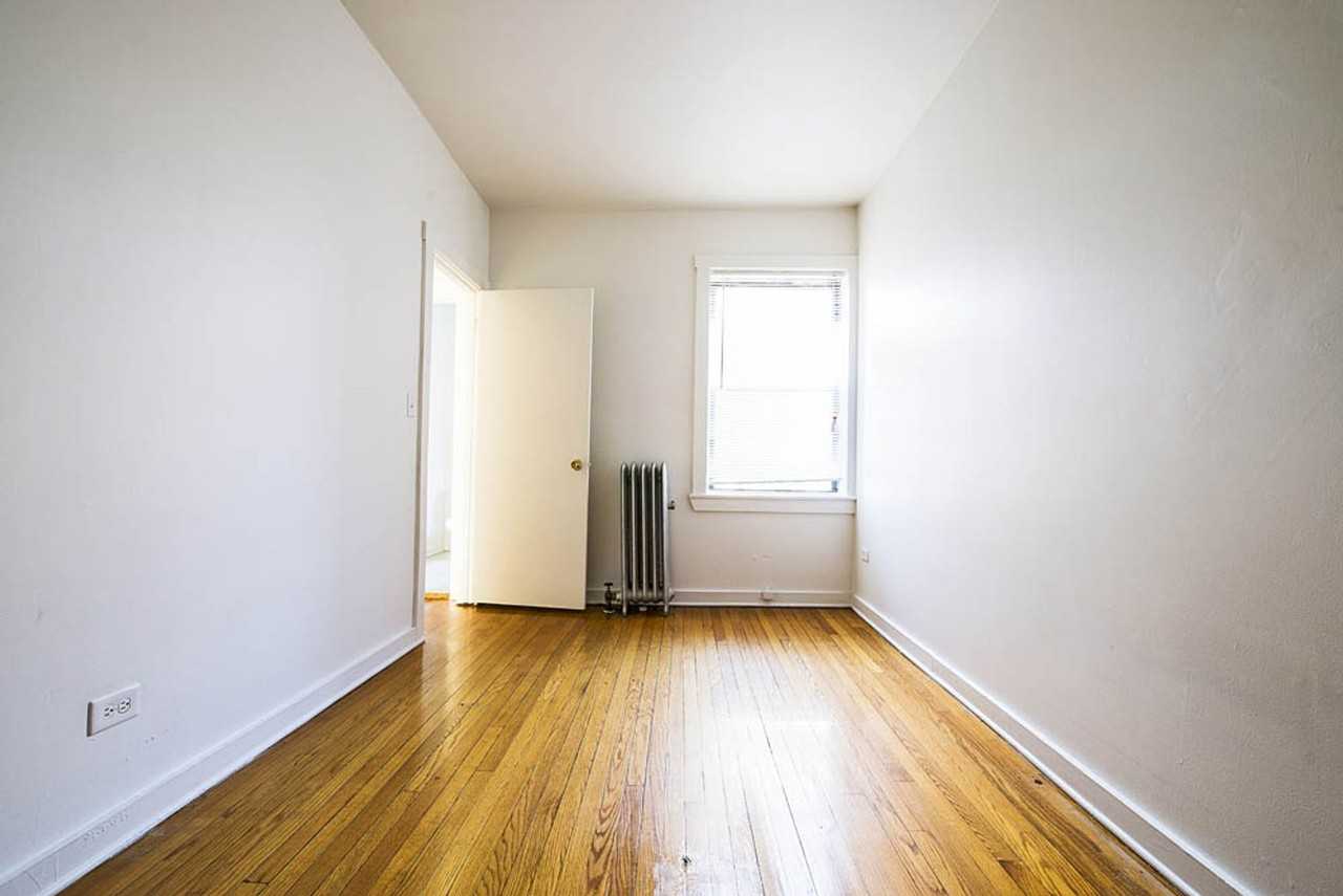 7417-25 S Phillips 2444 E 74th Place Chicago, IL 60649 - Photo 3 of 21