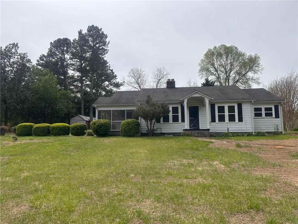 11100 Cumming Hwy - Photo 2 of 14