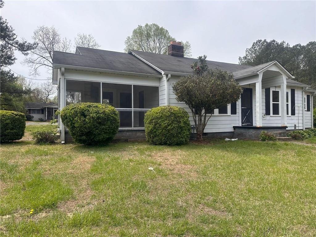 11100 Cumming Hwy - Photo 3 of 14