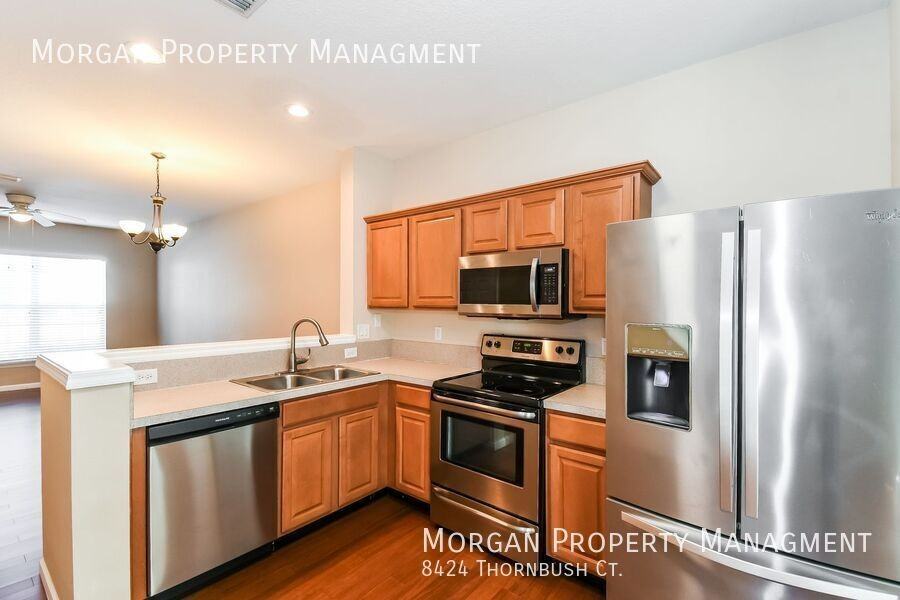 8424 Thornbush Ct - Photo 5 of 32