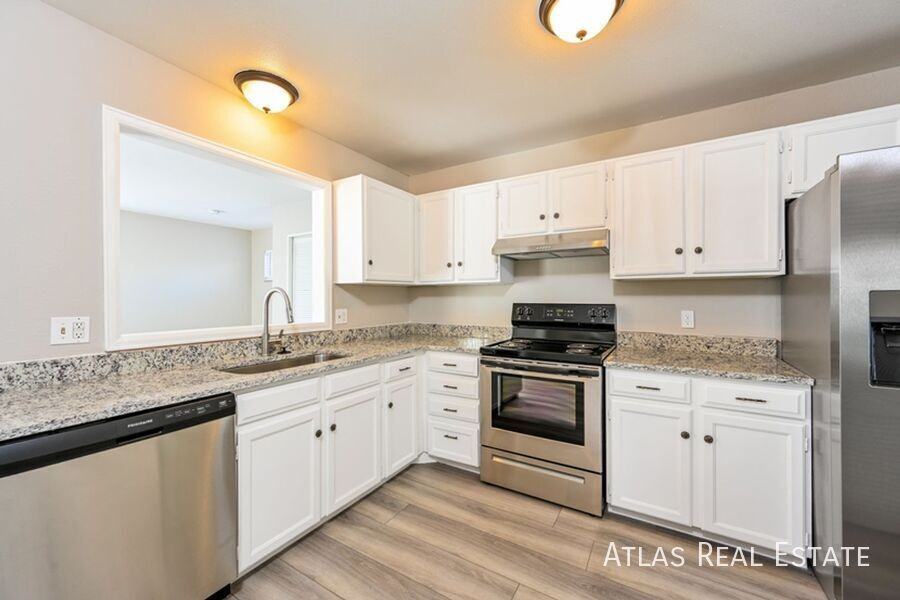 1255 S Lewiston Way - Photo 4 of 20