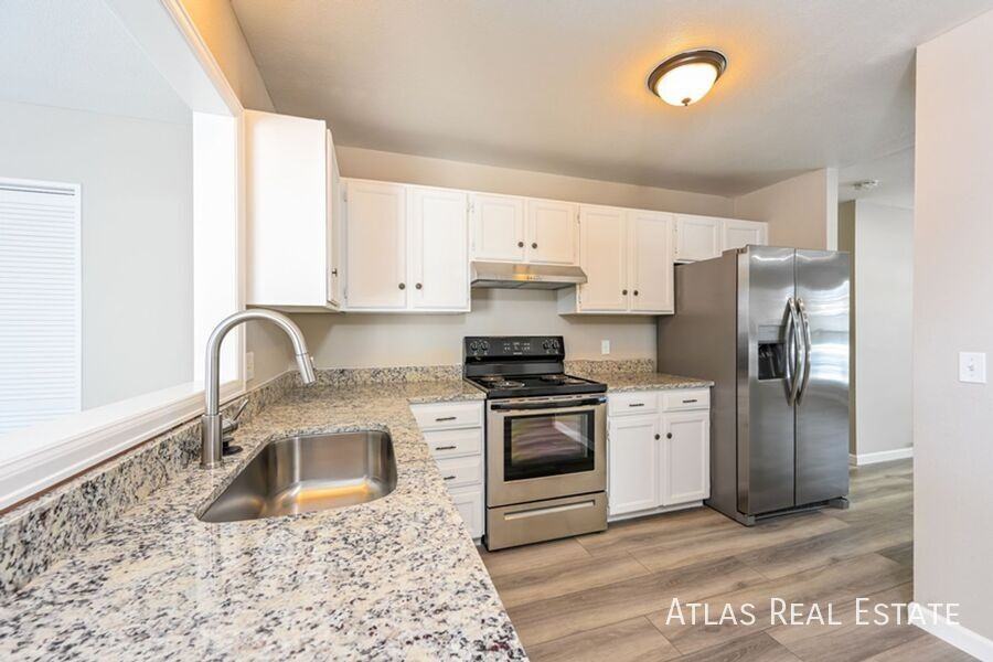 1255 S Lewiston Way - Photo 6 of 20