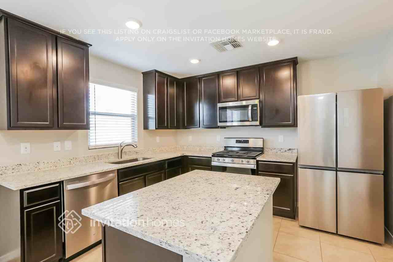 3907 S 79th Ln - Photo 6 of 16